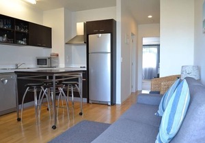 Upstairs fully self contained apartment with a queen bedroom.