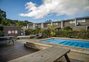 Upstairs fully self contained apartment with a queen bedroom.