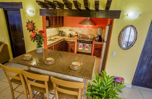 North Hotel Zone Condo | Hibiscus Suite ~ A Villa Garden