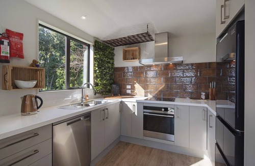 Tahunanui House | Blue Water Views - Modern, Sun-filled & Offers Fantastic Views over Tasman Bay.