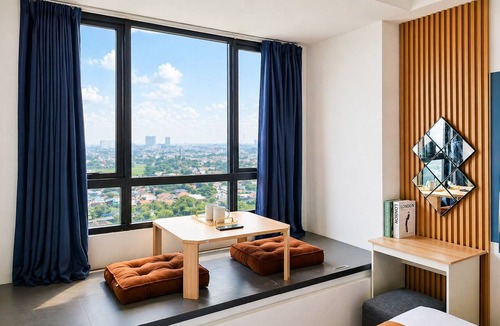 Panunggangan Utara Apartment | Chic Blue Tinted Studio Room At Apartment Collins Boulevard