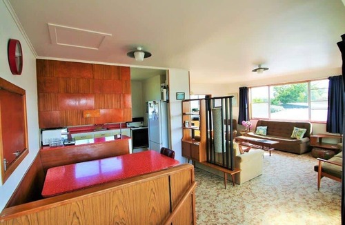 Wharewaka House | Classic holiday spot, memories at Wharewaka Beach