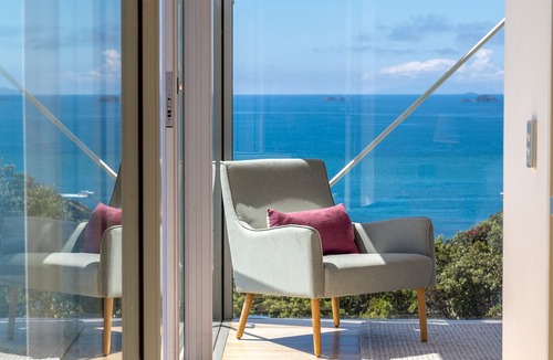 Matiatia Bay House | Cliff seated with fabulous sea views, a solar heated pool and a new spa pool!