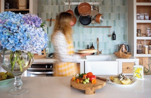 Pouto Cottage | Luxury eco-design waterfront fishing Batch with guests' vegetable garden.