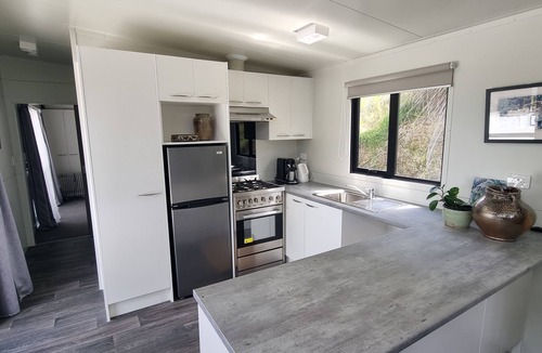 Matakana House | Matakana Puri Retreat. Cozy and comfortable pet friendly accommodation.