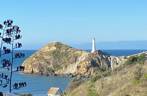 Castlepoint Apartment | Modern apartment with stunning views of Lighthouse and short walk to beach.