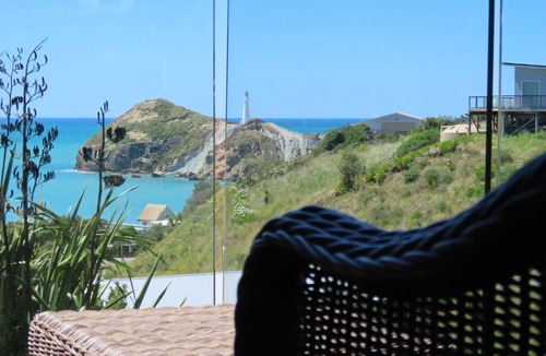 Castlepoint Apartment | Modern apartment with stunning views of Lighthouse and short walk to beach.