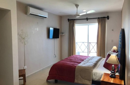 Chicxulub Puerto Apartment | Mystic Lounge - on the beach with swimming pool