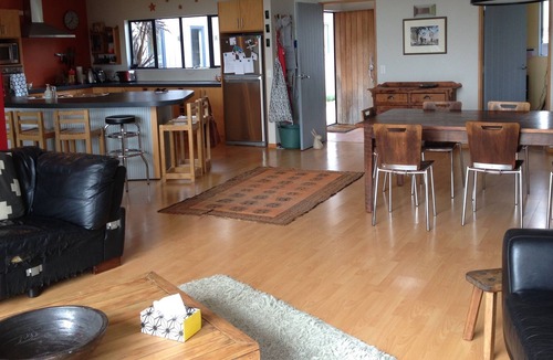 Raglan House | Okete Landing - Lifestyle retreat on Raglan harbour with grass tennis court.