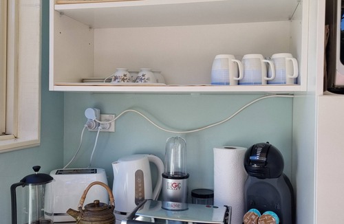 Auckland Cottage | "Palm Haven' Swanson,npeaceful semi-rural lifestyle living.