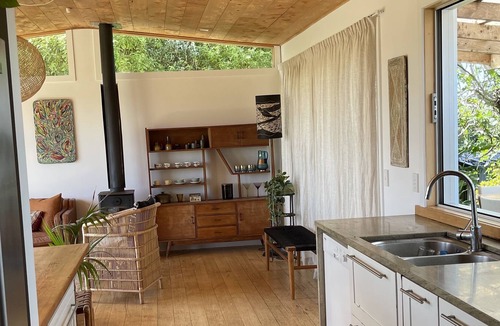 Surfdale House | Private. Sunny. Twin sea views, cedar tub, mediterranean gardens, flat lawns.