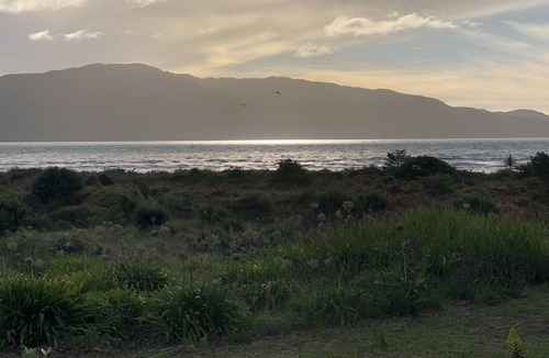 Paraparaumu Beach Apartment | RECENTLY RENOVATED PROPERTY RIGHT ON THE SAND! NEW DECK AND FREE WIFI!