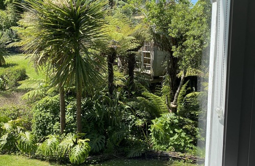 Stanmore Bay Cottage | Rosie's cottage in Stanmore Bay , a short walk to beach with a great seaview.