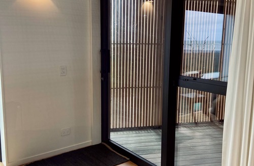 Warea House | Sauna, seafront, and architecture steps away from the Tasman Sea