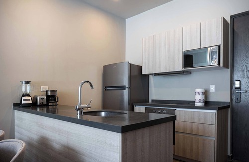 Monterrey Apartment | Sleek Apartment with Mountain views, Pool & Gym