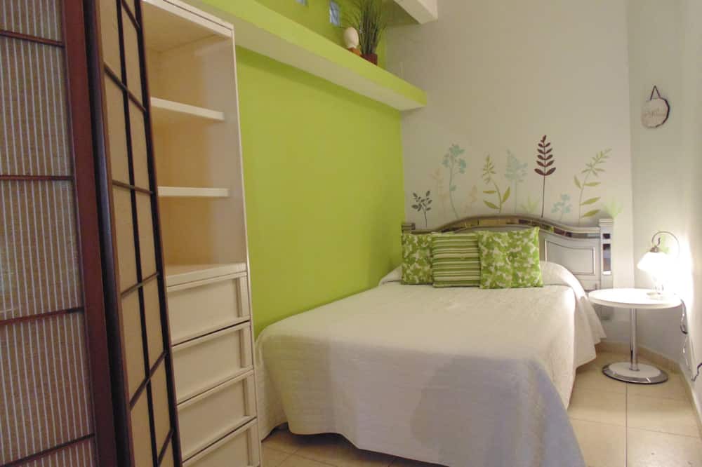Photo of Bedroom in Guadalupe Inn