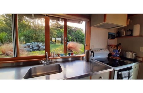 Tuateawa House | "The Rock" is simply one of the best coastal experiences here in the Coromandel.
